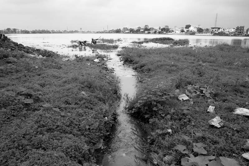 A channel conveying untreated sewage into Moti Jheel in Motihari, Bihar